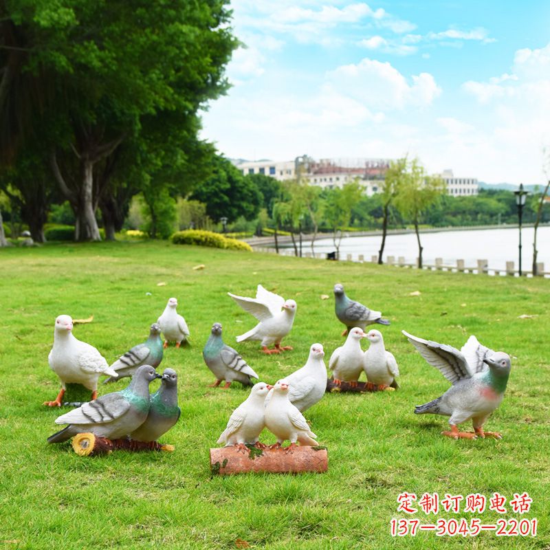 长沙大学雕塑手举和平鸽