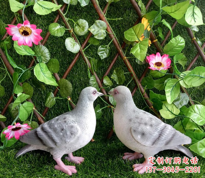 长沙雕塑小女孩一只手拿书一手和平鸽