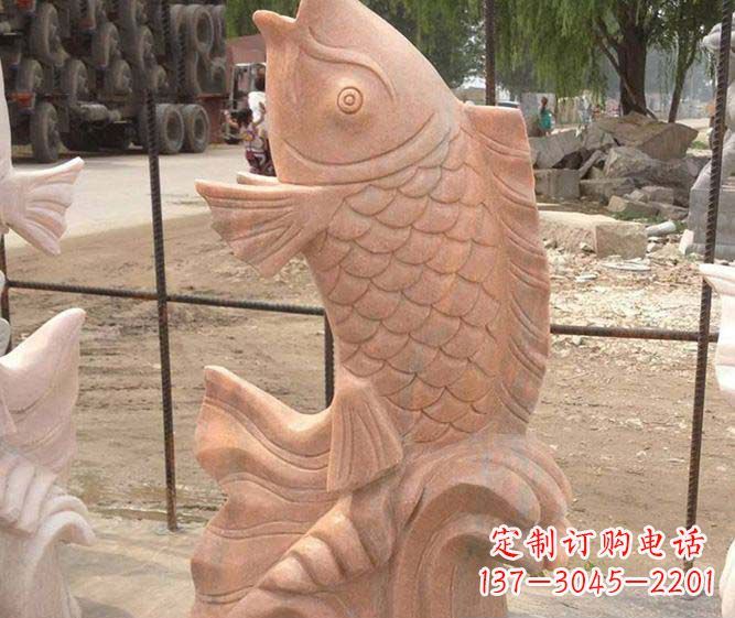 长沙公园景观晚霞红石雕鱼喷泉