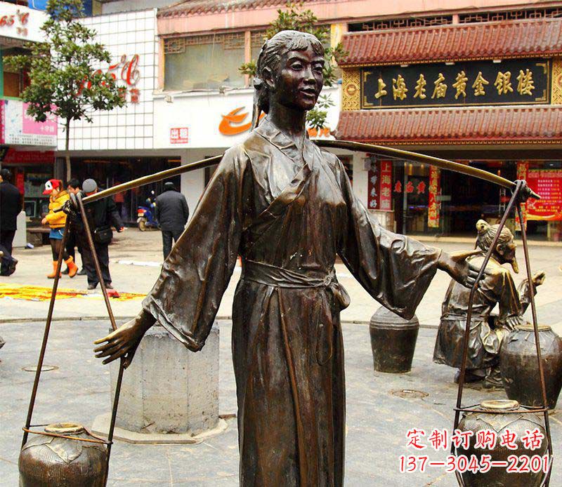 长沙挑着罐子的古代女人铜雕