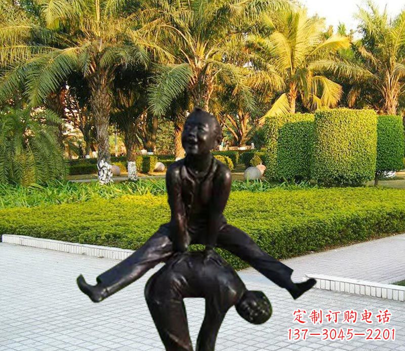 长沙跳山羊的儿童铜雕
