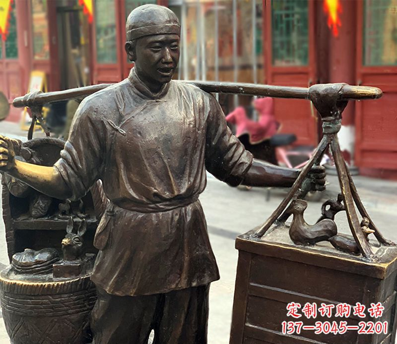 长沙铜雕步行街卖货郎人物雕塑