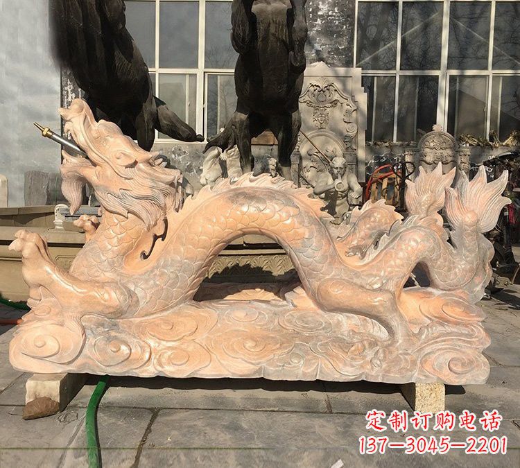 长沙晚霞红石雕喷水龙